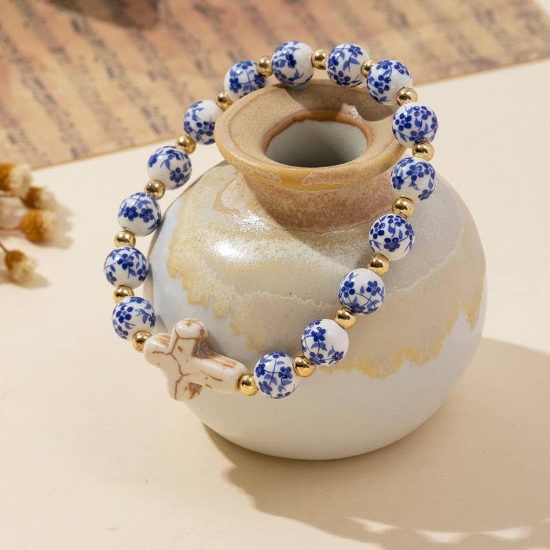 Blue Ceramic Bead Bracelet With Cross Charm And Pearl Pop